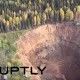 Dron graba cráter que pone en peligro casas cercanas en Siberia